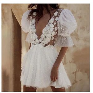 White cocktail wedding dress. Pearl + tulle adornments. So cute on!